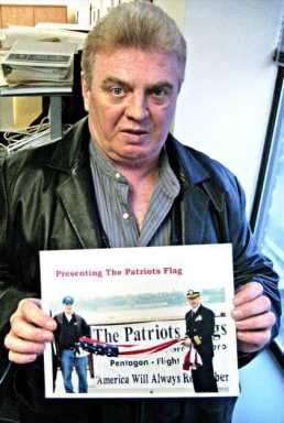 Glen Oaks Ground Zero worker presents Sept. 11 flag to ship