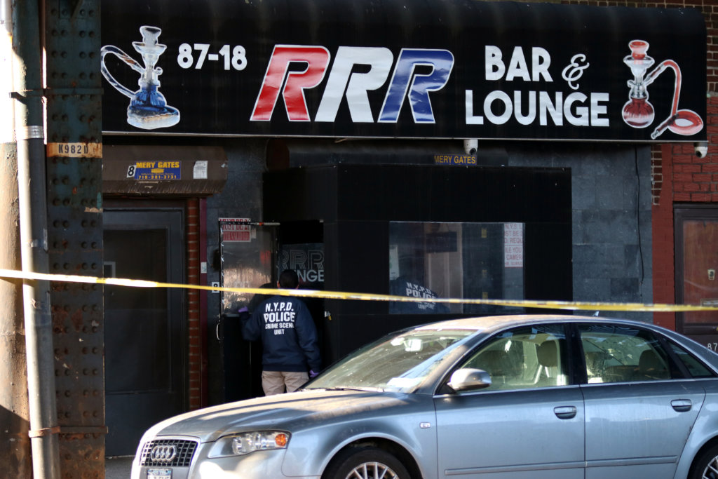 The scene outside RRR Bar and Lounge in Ozone Park after a police-involved shooting on March 9.