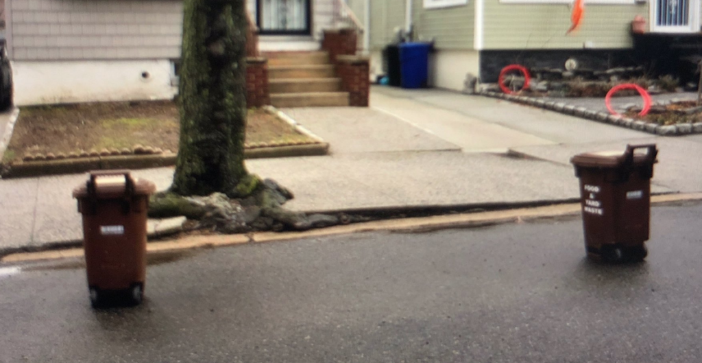 Cops crack down on parking spot savers in Maspeth who blocked street