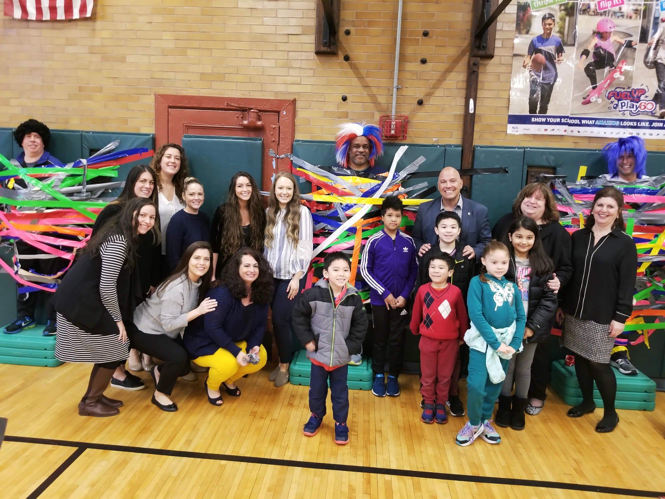 College Point teachers get duct taped to the wall after school wins $400K  in funds for new gymnasium – QNS