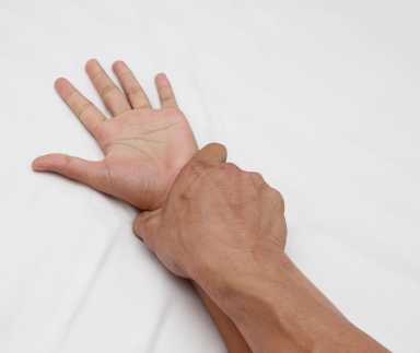 A hairy man’s hand holding a woman hand for rape and sexual abuse concept
