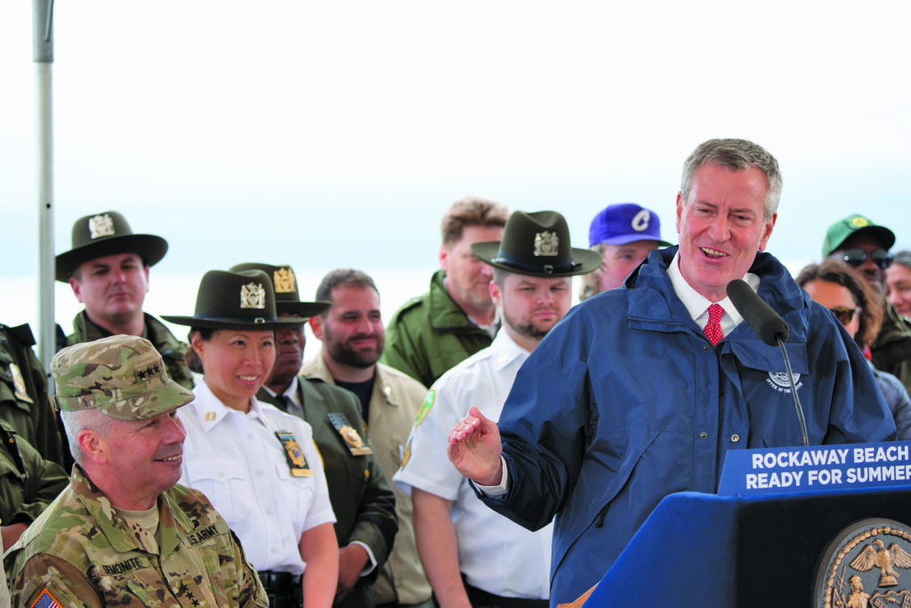 Mayor Bill de Blasio visits Rockaway Beach to announce that it will reopen in time for the summer, on Tuesday, May 14.