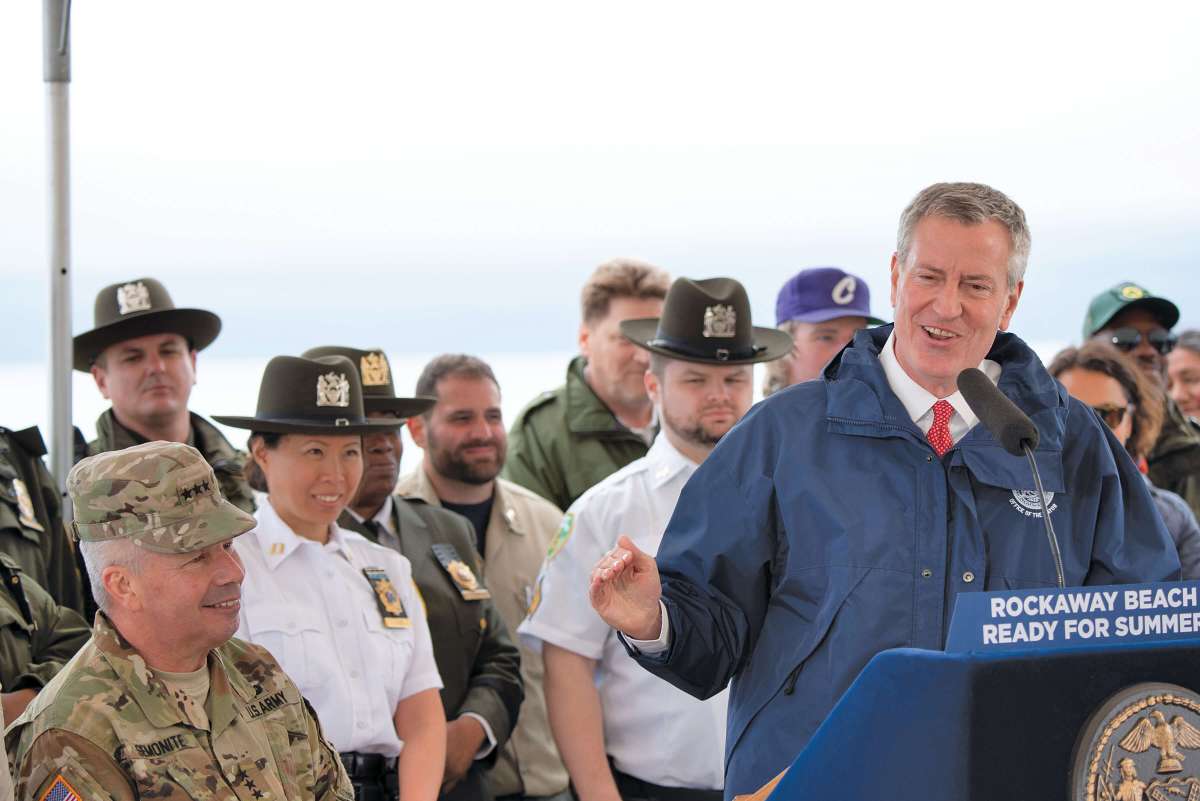 Mayor Bill de Blasio visits Rockaway Beach to announce that it will reopen in time for the summer, on Tuesday, May 14.