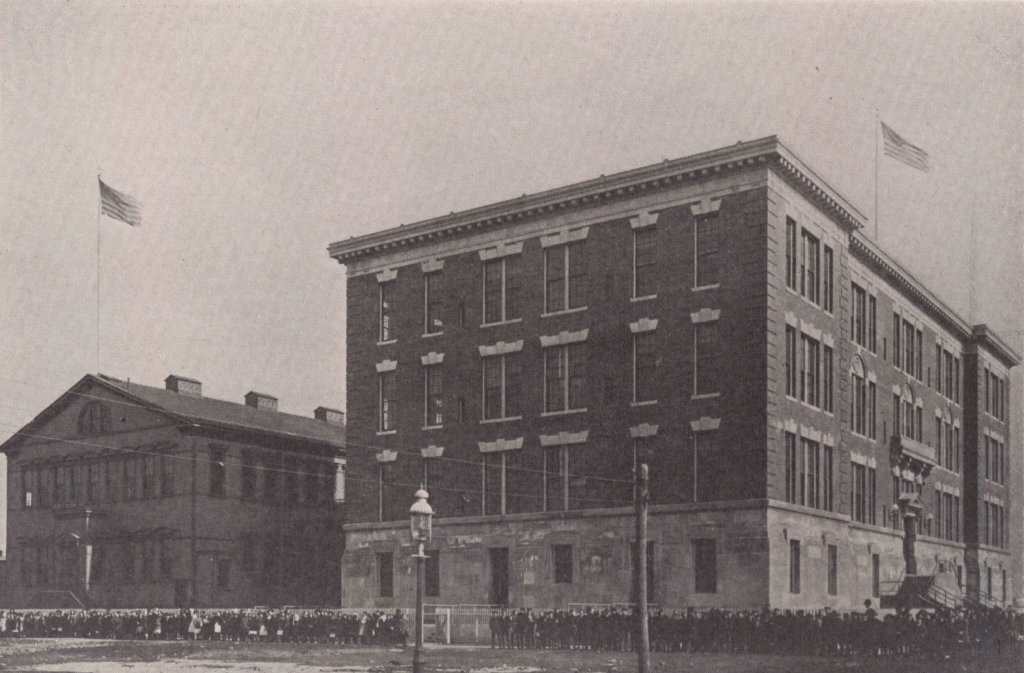 This 1908 photo shows the newly-constructed P.S. 68 in Glendale in the foreground, with the former schoolhouse at left.