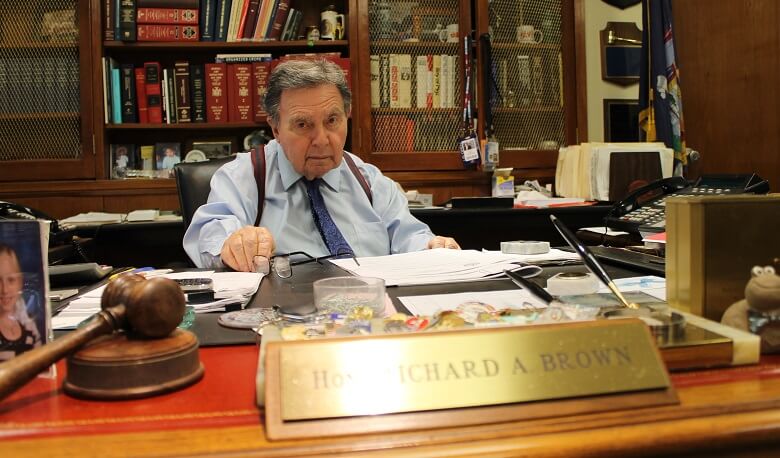 Queens District Attorney Richard A. Brown at his desk in this 2016 photo.