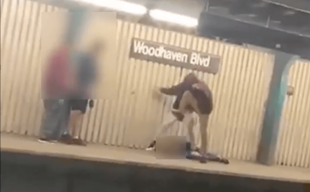 Two men are pictured attacking a 29-year-old man at the Woodhaven Boulevard train station in Woodhaven on June 23.