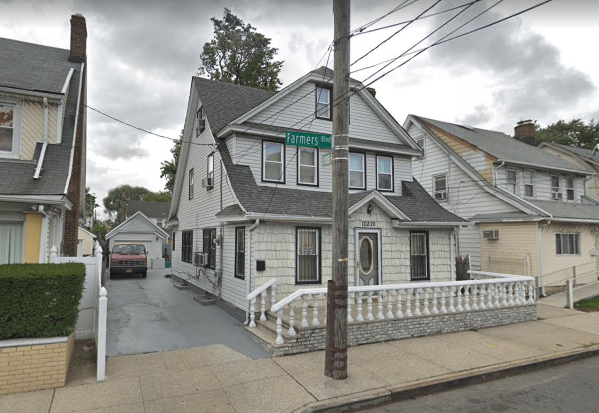 A woman was found dead in the garage of this Hollis home on June 29.