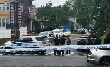 Police officers at the scene near Crocheron Park in Bayside where an infant was found dead on June 18.