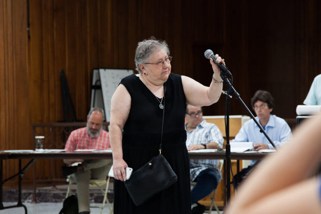 One of the speakers at the July 10 Community Board 5 meeting, a resident of 59th Street in Glendale, who voiced opposition to a 66-unit residence for homeless disabled persons in the neighborhood.