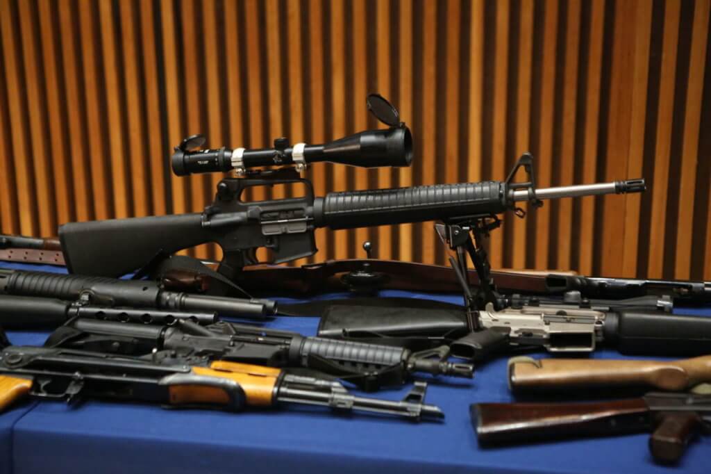 Some of the weapons seized in April 2018 from the Bayside home of Ronald Drabman, who pleaded guilty to illegally owning a large arsenal of weapons.