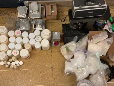 Quantities of powder believed to be cocaine and various prescription pills, including oxycodone and Viagra, were recovered from a Corona smoke shop during an Aug. 23 police raid.