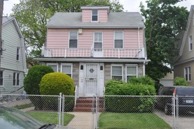 A 66-year-old woman was found dead inside this home on 172nd Street in St. Albans on Aug. 22.