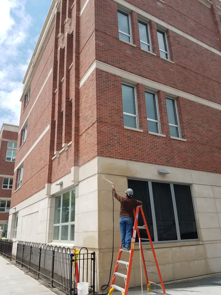 Worker puts some finishing touches on P.S. 398 in Jackson Heights, the borough's newest school opening Monday, Sept. 5.