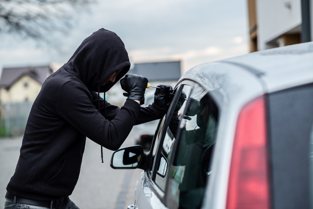 bigstock-Car-Thief-Trying-To-Break-Into-129418745-1024×683