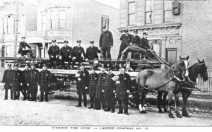 Members of the Ivanhoe Hook and Ladder Company 10 are pictured in this early 20th century photo with their horse-drawn wagon.