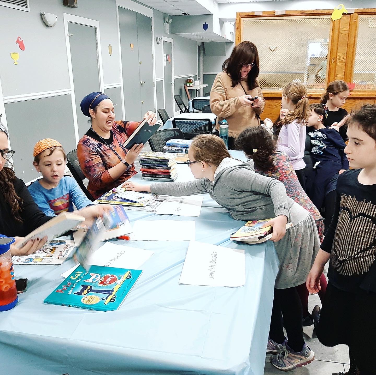 Volunteers from The Young Israel of Queens Valley synagogue organize