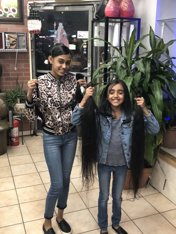 Richmond Hill sisters donate locks of hair to local nonprofit
