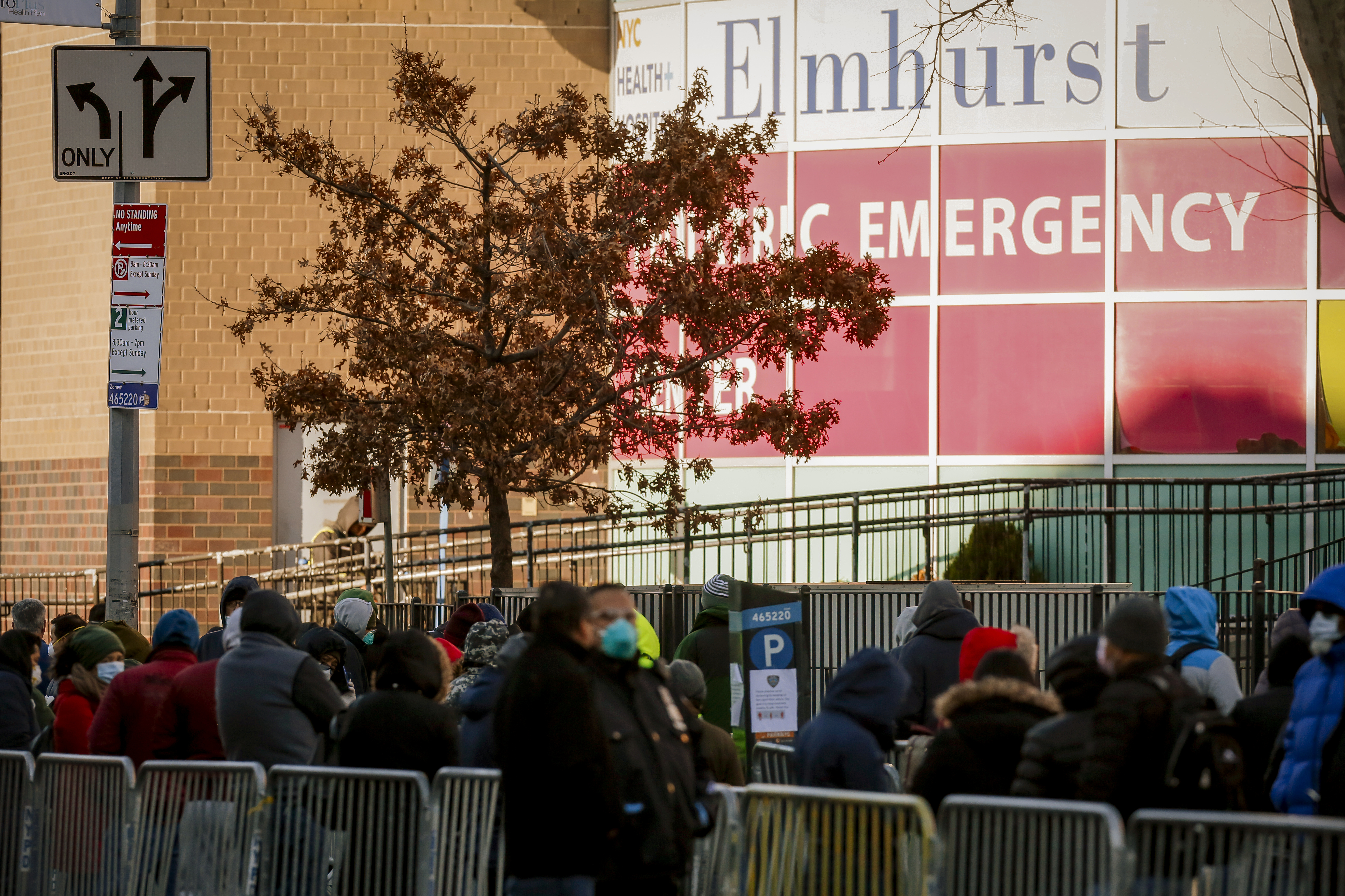 People line up early in the morning to be tested for coronavirus disease (COVID-19) outside Elmhurst Hospital Center in the Queens borough of New York