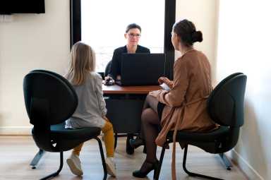 a mother and daughter in school talk