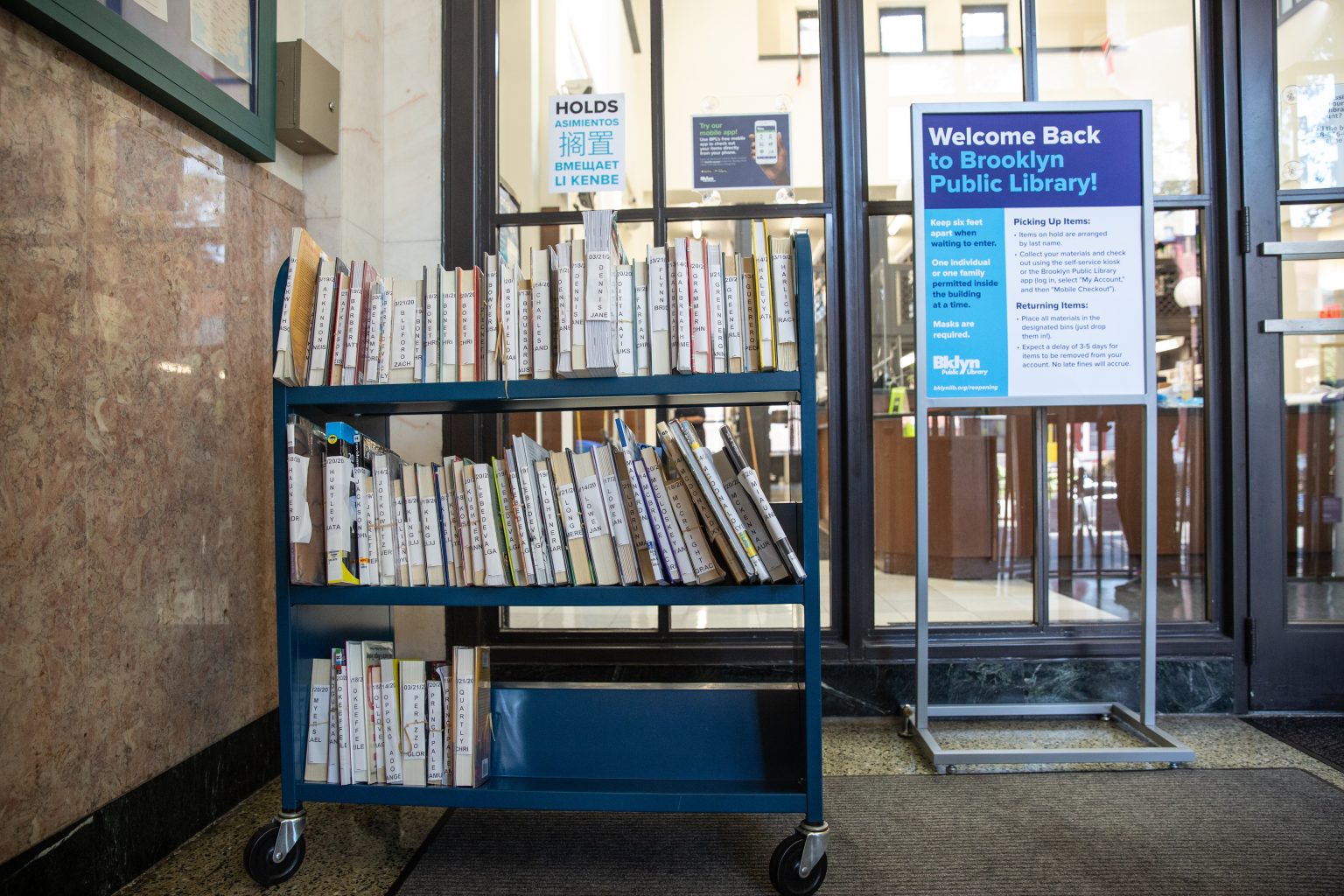 Seven public libraries in Queens to reopen Monday for 'grab-and-go' service  –