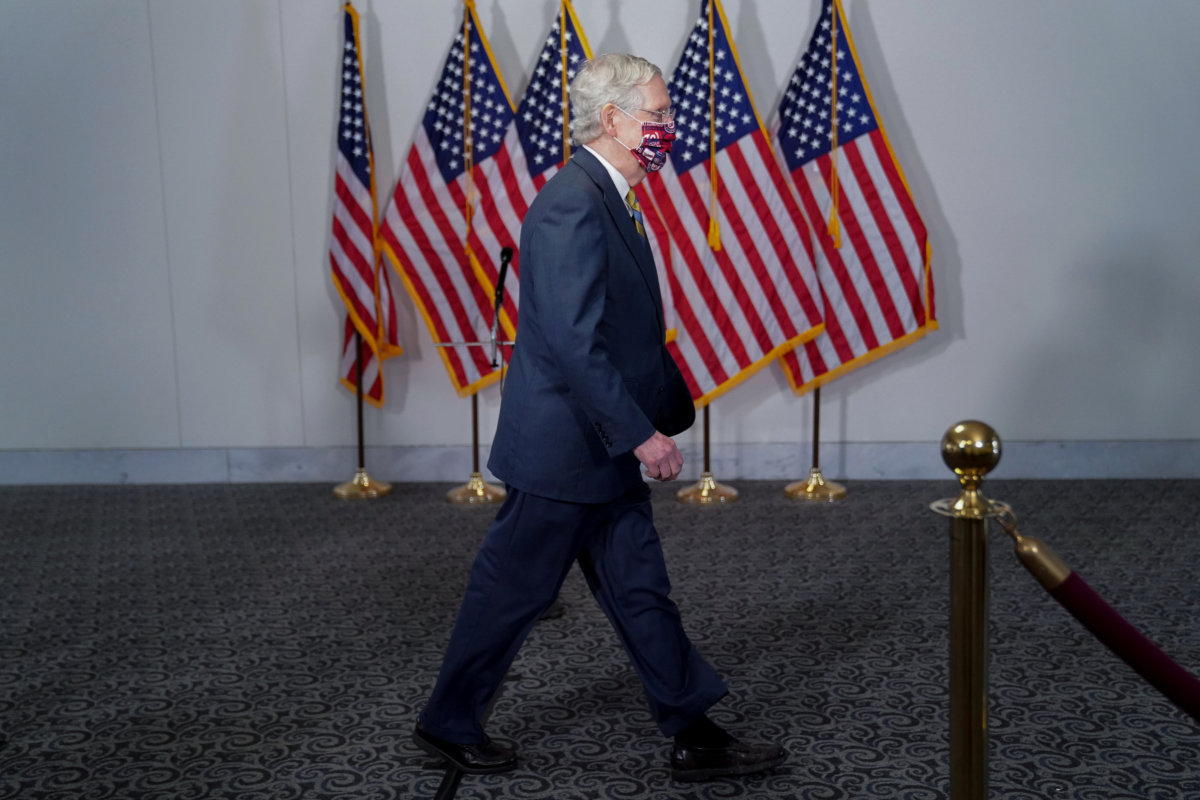 Senate Majority Leader McConnell arrives to a luncheon on Capitol Hill in Washington
