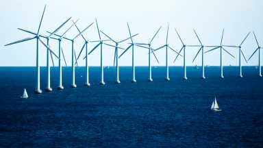 Windmills and Sailboats on the Ocean