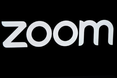FILE PHOTO: The Zoom Video Communications logo is pictured at the NASDAQ MarketSite in New York