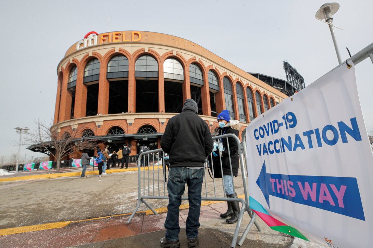 A man arrives to receive the coronavirus disease (COVID-19) vaccine outside Citi Field, the home stadium of MLB’s New York Mets in Queens, New York