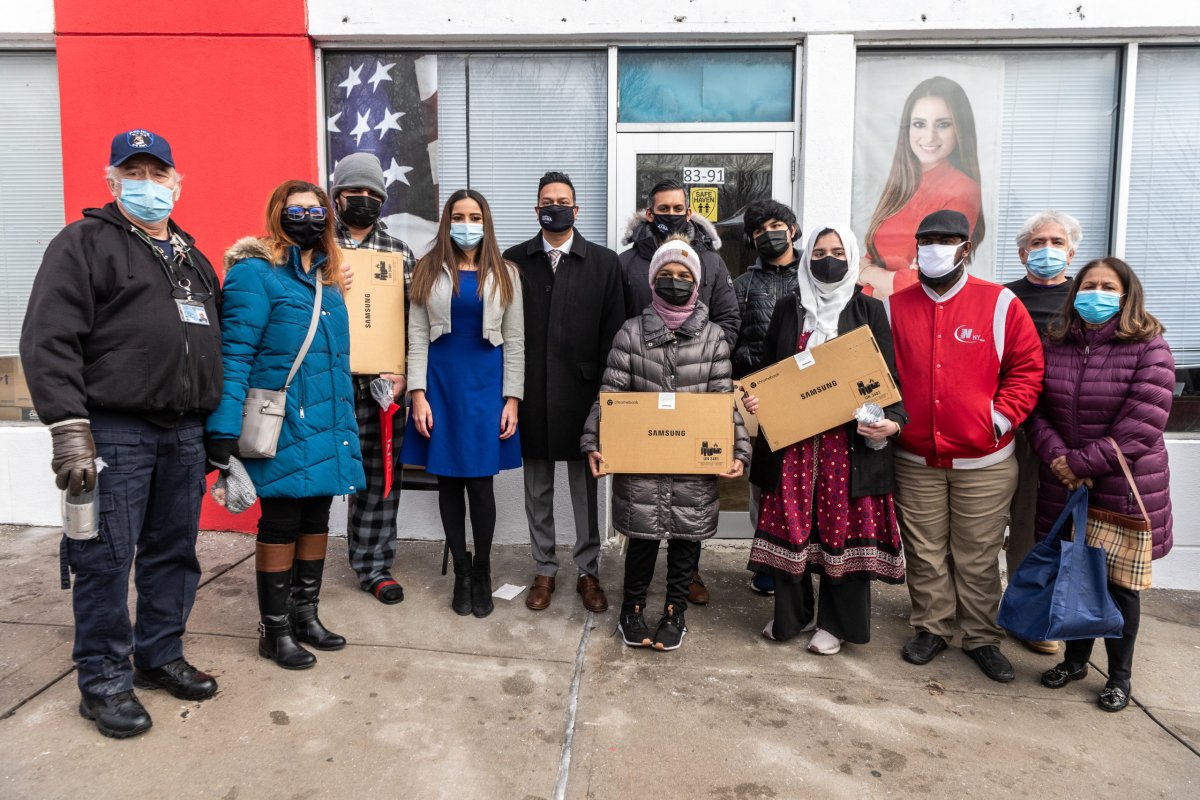 NYC:Rajkumar and Zarar Realty donate 13 laptops