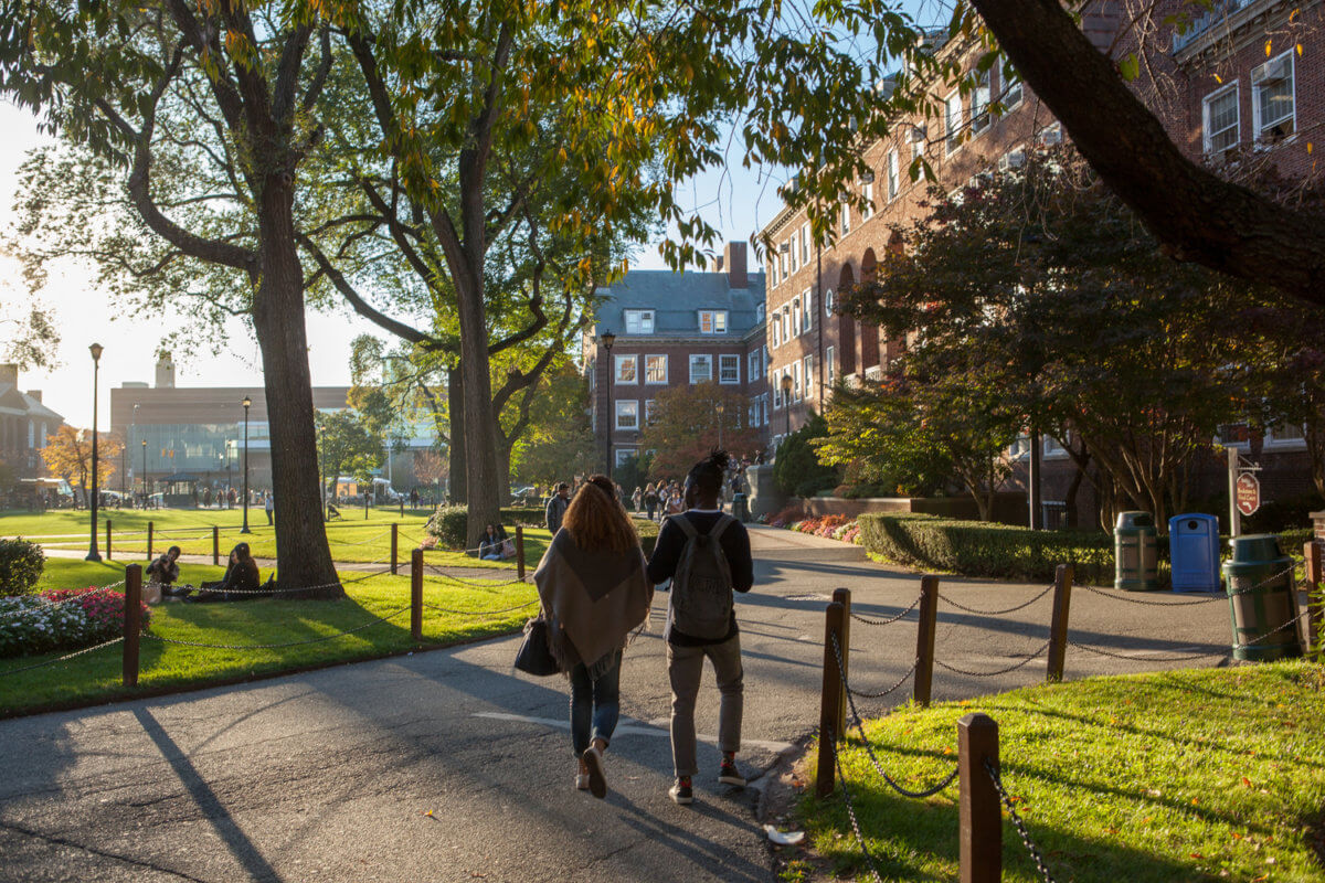 Students walking on the Brooklyn College campus in the fall.