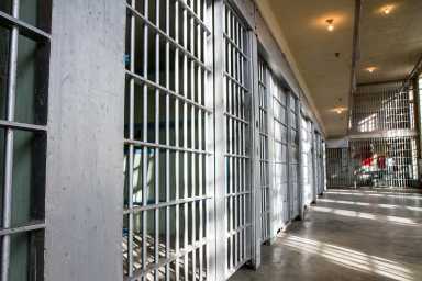 prison bars all locked up