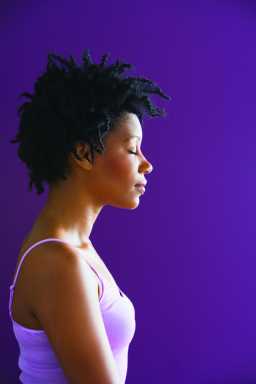 Side view of African woman with eyes closed