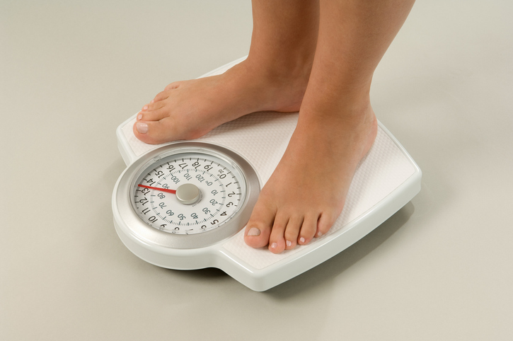 Female feet on scales