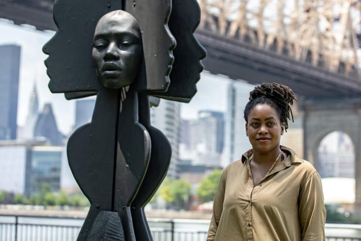 Artist Tanda Francis her sculpture ‘Be Heard’ in Queensbridge Park, Queens borough of New York