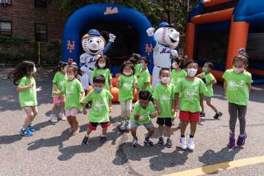 Mr. & Mrs. Met visit Flushing YMCA summer camp