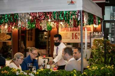 People enjoy outdoor dining amid the coronavirus disease (COVID-19) outbreak in Manhattan