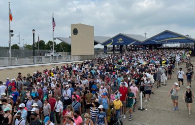 Tennis fans stand in line to enter USTA Billie King National Tennis Center on the first day of 2021 U.S. Open tennis tournament