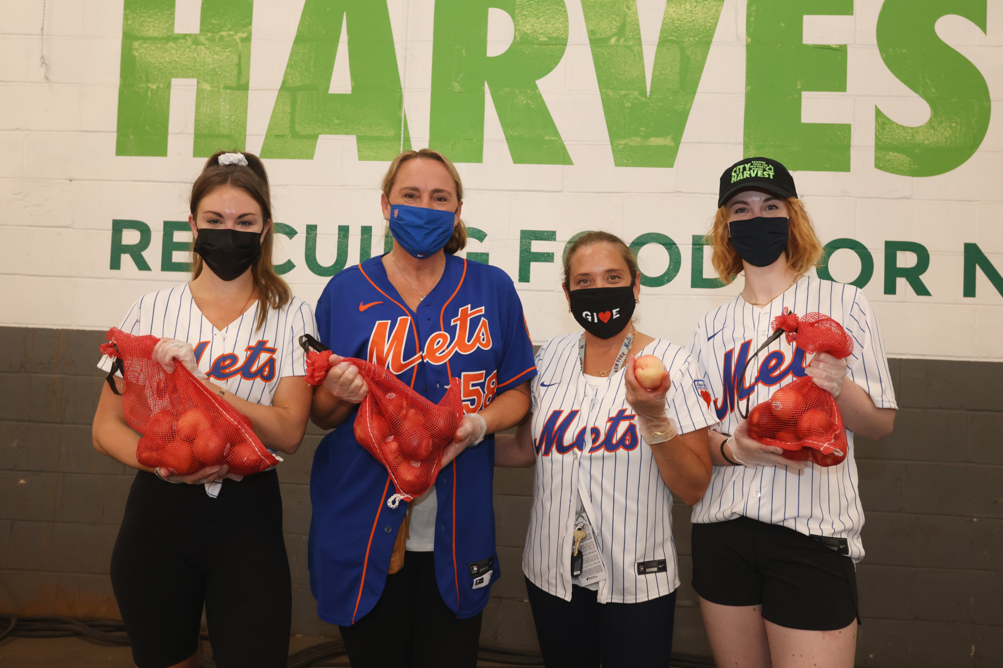 New York Mets’ wives pack food for families in need around NYC