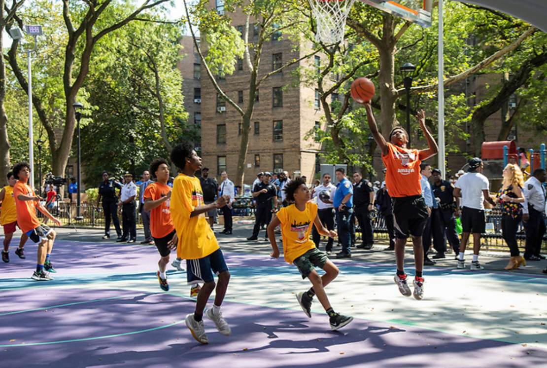 NYPD, community leaders unveil renovated Frederick Douglass Houses basketball  court