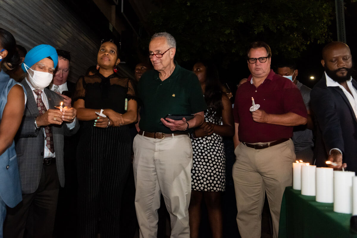 Elected officials and community members hold candlelight vigil for Haiti Earthquake