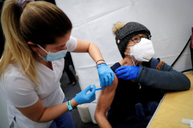 FILE PHOTO: SOMOS Community Care administers Moderna COVID-19 Vaccine at pop-up site in New York