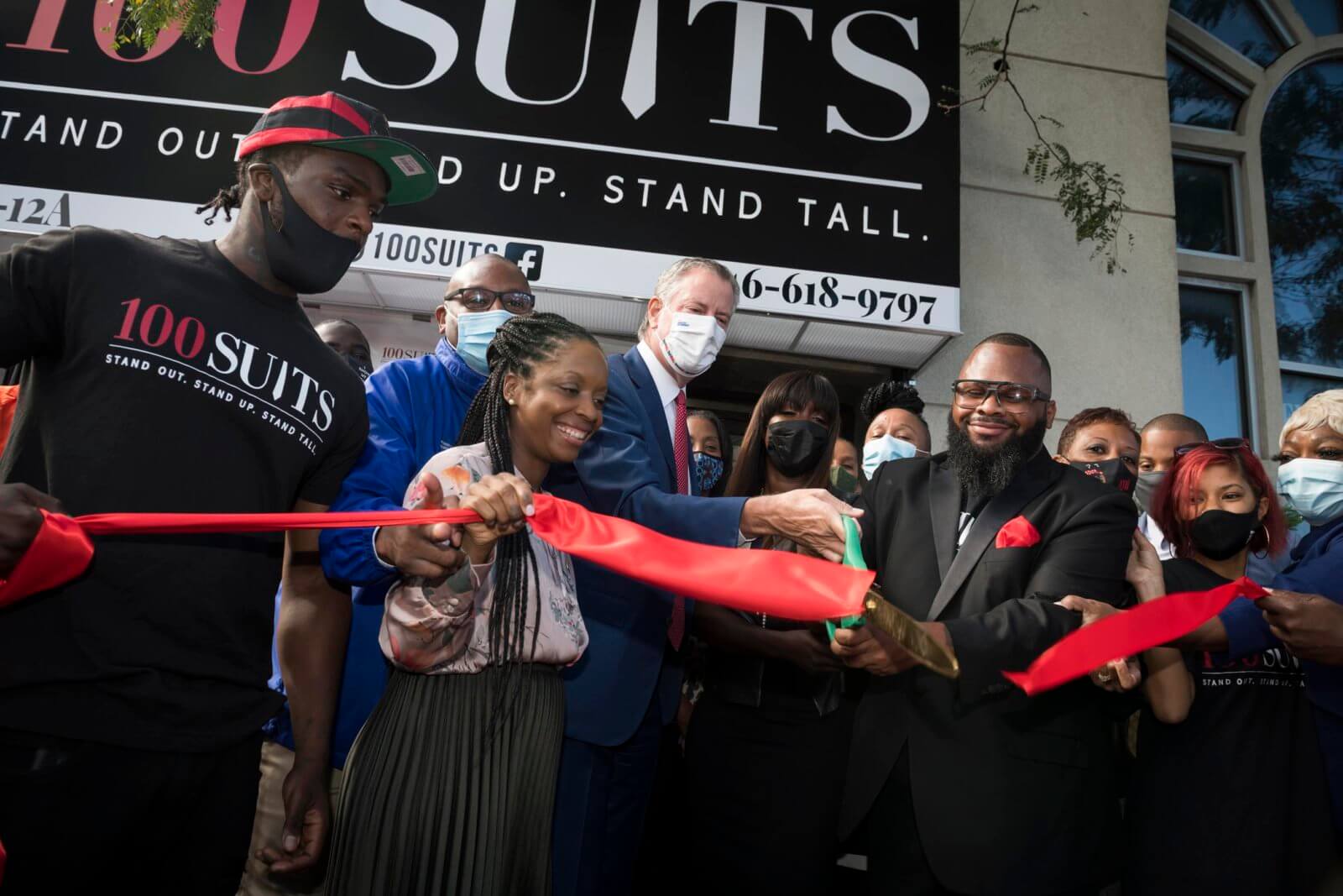 100 Suits for 100 Men celebrates expansion in Queens