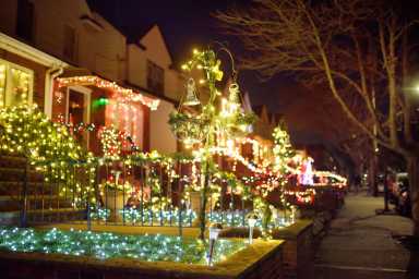 A street decorated for Christmas and New Year holidays in the Dyker Heights neighborhood, New York, USA.