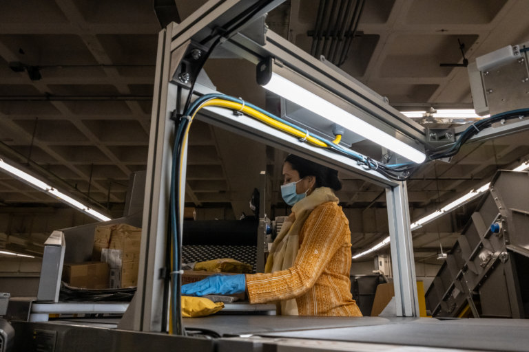 Flushing USPS distribution center breaks holiday records