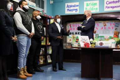 2022-02-03T212657Z_2085279617_RC2GCS9NRJ15_RTRMADP_3_USA-BIDEN-scaled