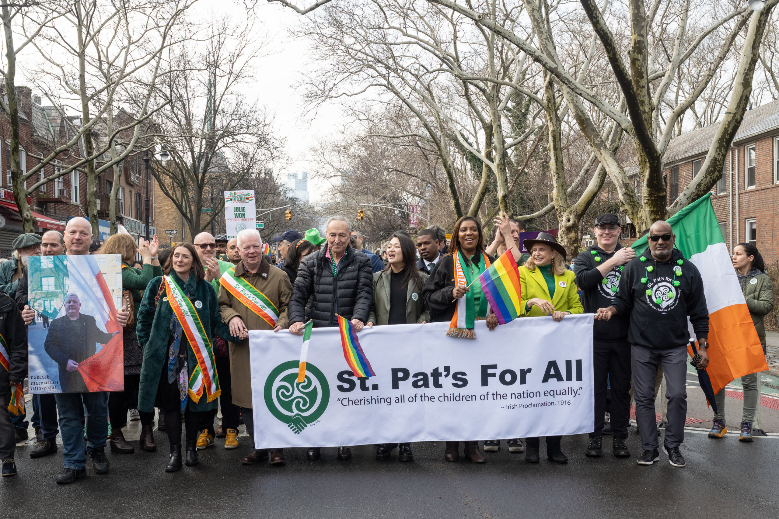 Elected officials and family members of the late Tarlach Mac Niallais lead the St. Pat's For All Parade in Sunnyside on March 6, 2022. (Photo by Gabriele Holtermann)