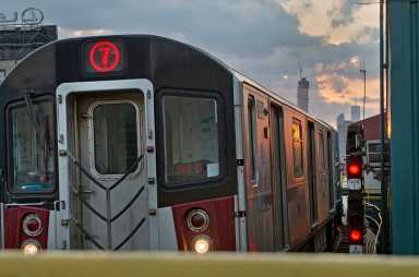 Corona 7 train subway surfer injured