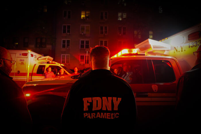FDNY personnel outside a hospital after an EMS lieutenant was fatally stabbed