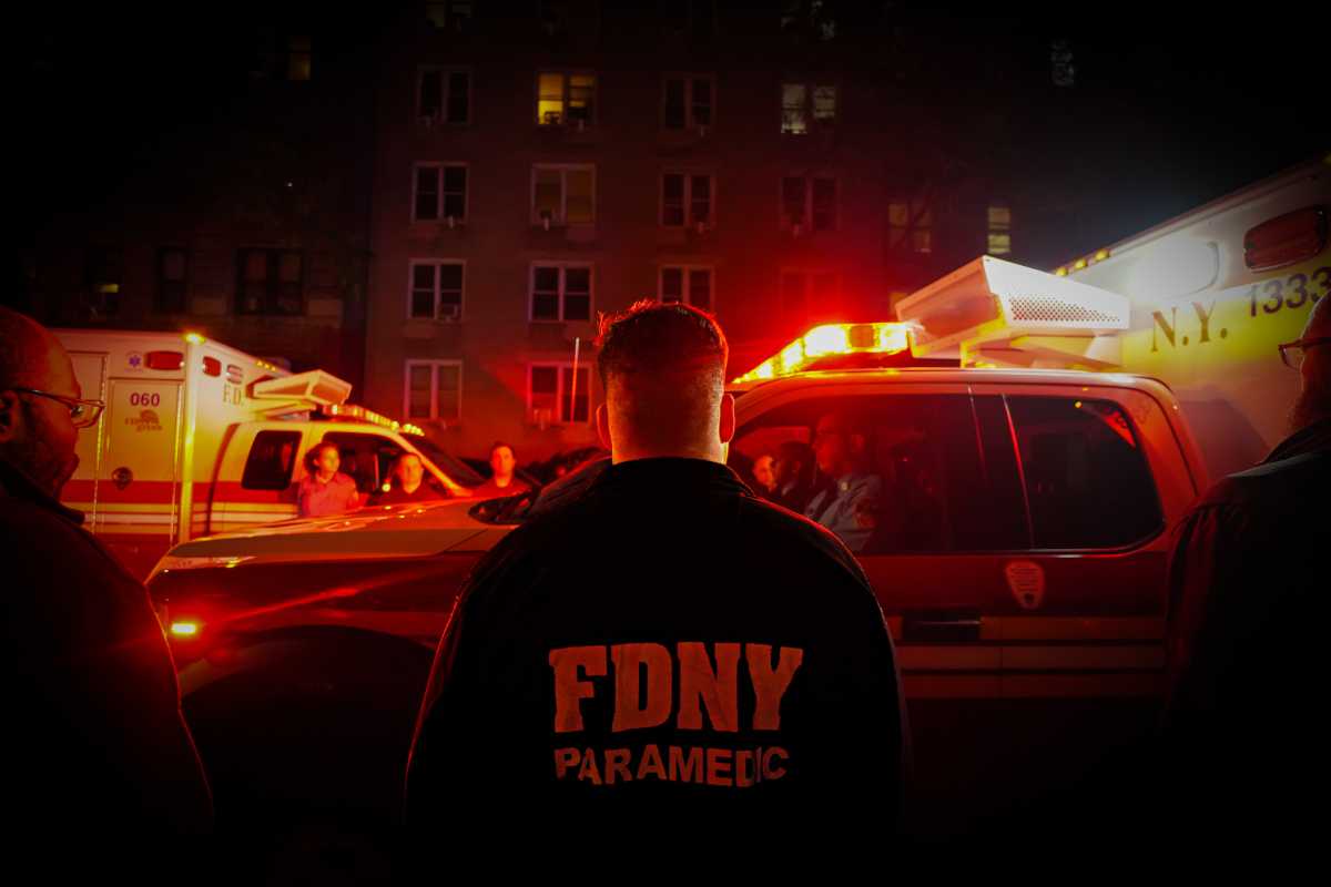 FDNY personnel outside hospital after EMS lieutenant fatally stabbed