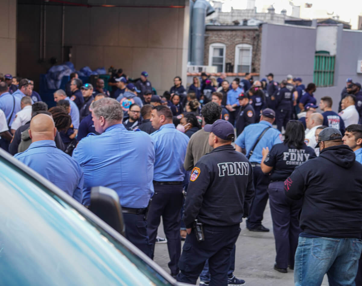 FDNY personnel outside hospital after EMS lieutenant fatally stabbed